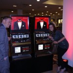 Guests enjoy the "Vegas Dozen" Promo Slot at Saks 5th ave at the fashion show mall in Las Vegas, NV